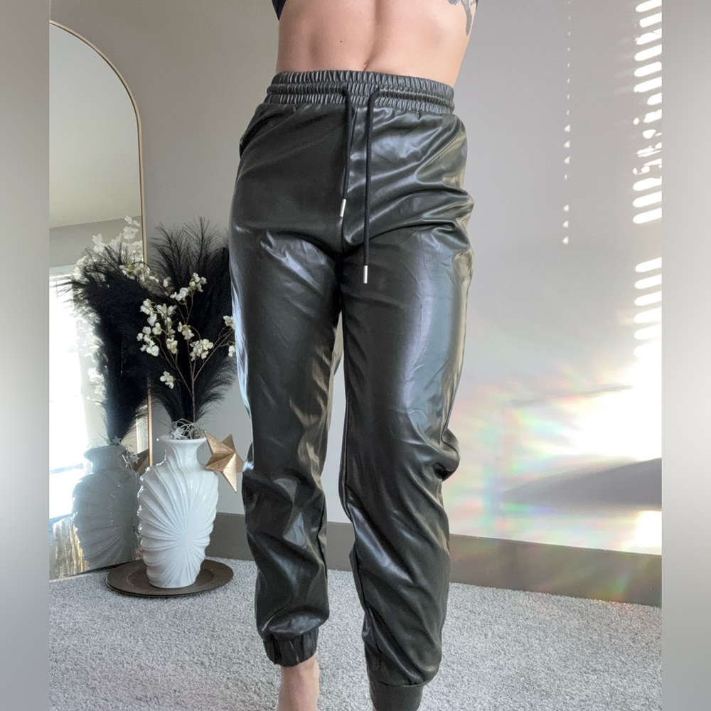 Army green faux leather joggers